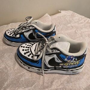Custom hand painted Nike Sonic Sneakers 
Nike Kids Black, Blue